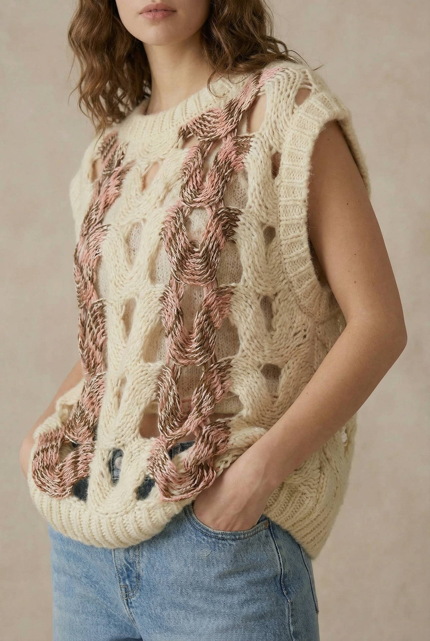 Crochet Knit Top with Floral Appliqué Detailing.