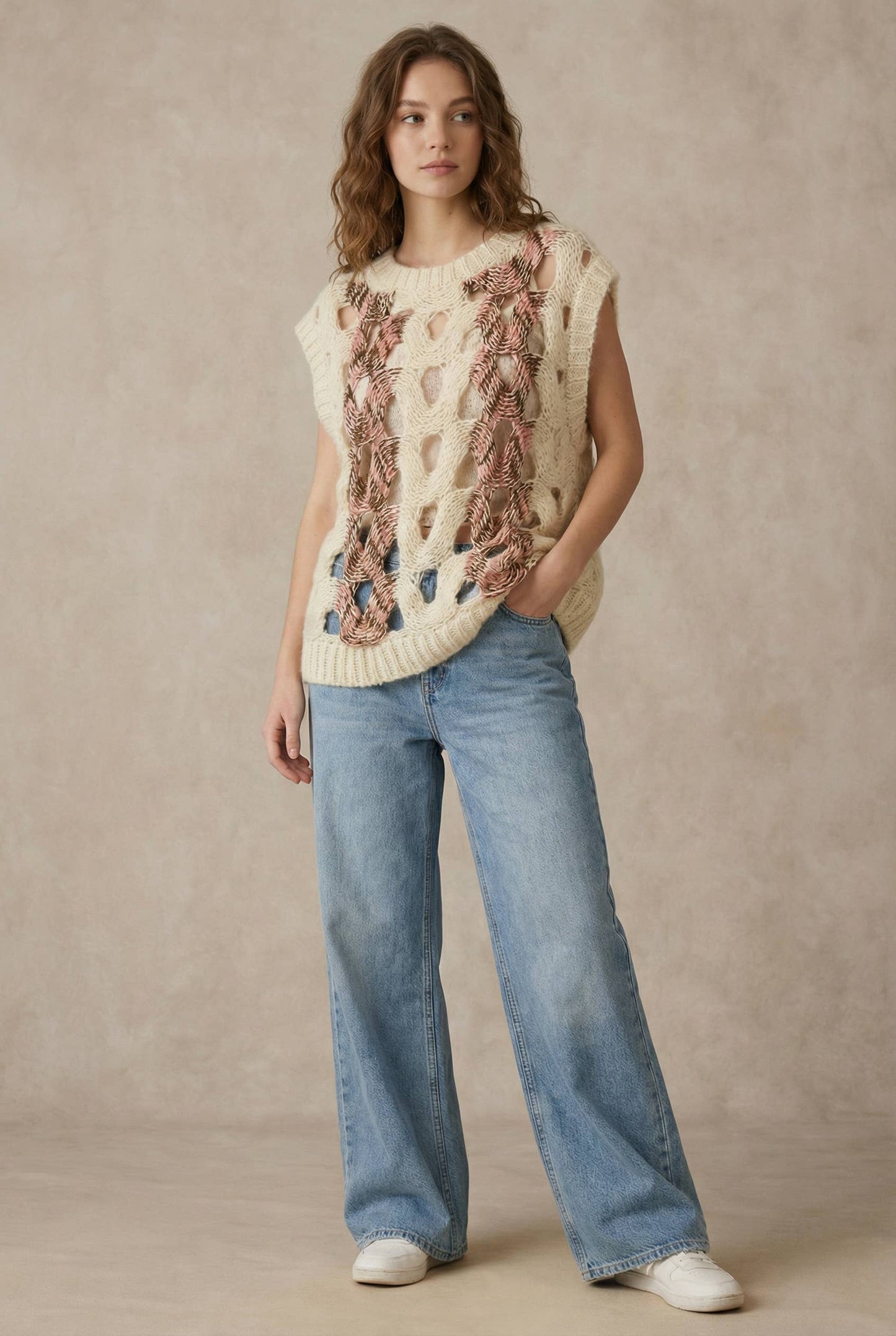 Crochet Knit Top with Floral Appliqué Detailing.