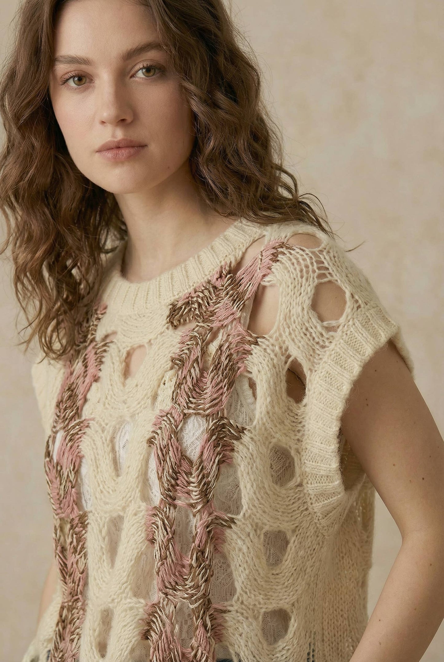 Crochet Knit Top with Floral Appliqué Detailing.