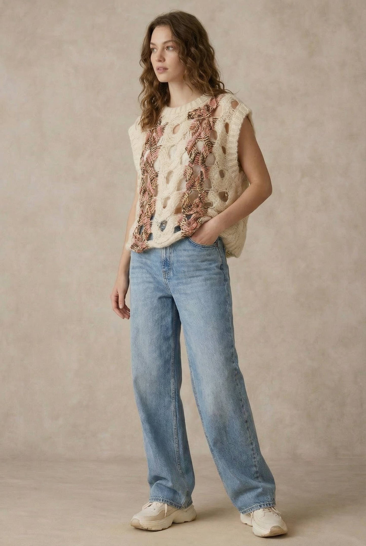 Crochet Knit Top with Floral Appliqué Detailing.