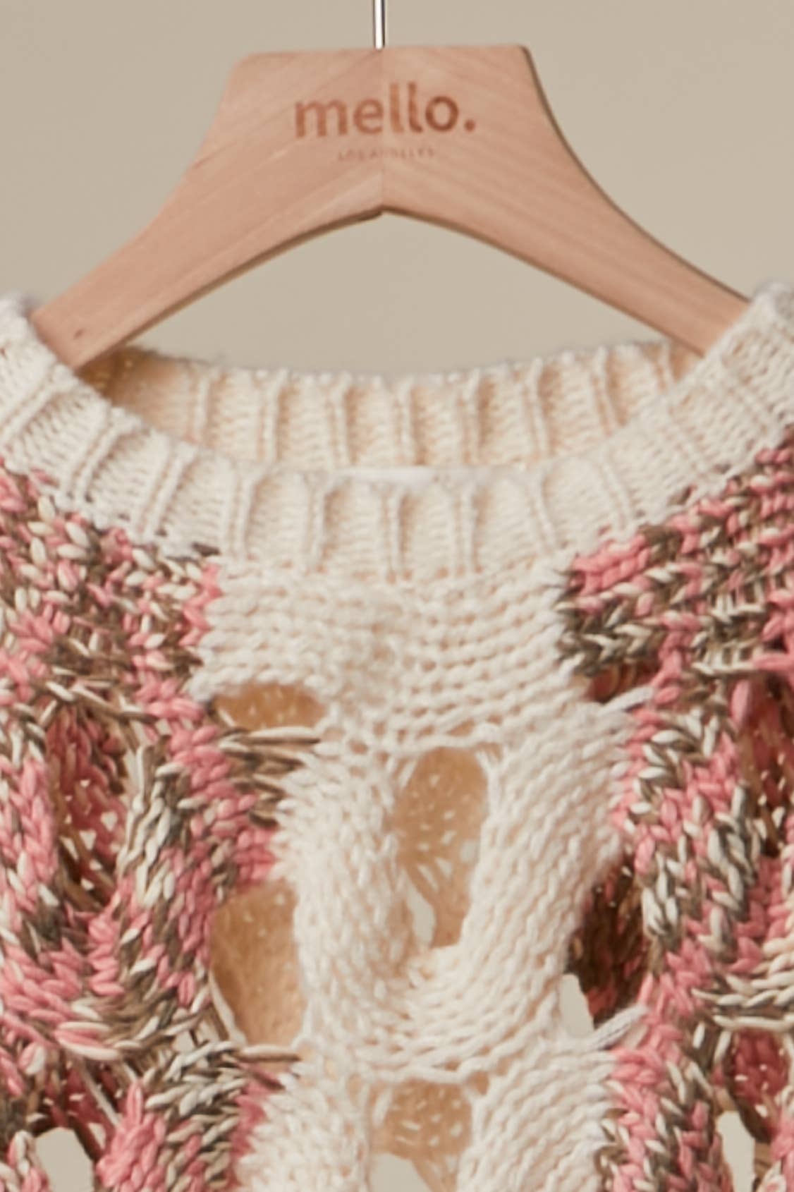 Crochet Knit Top with Floral Appliqué Detailing.