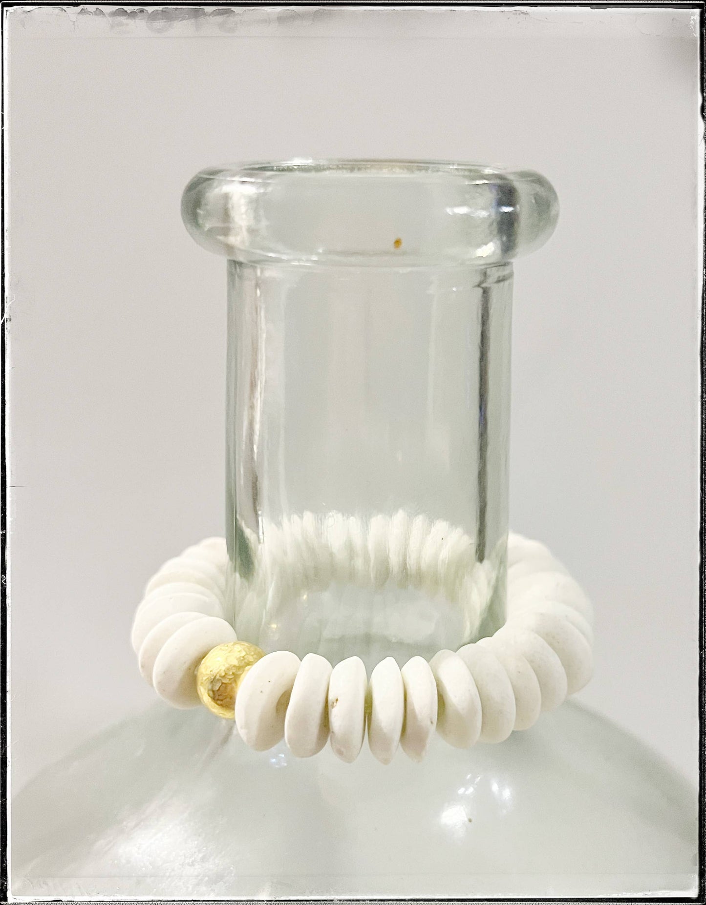 White Ashanti Glass Bead Stretch Bracelet Brass Charm Gold